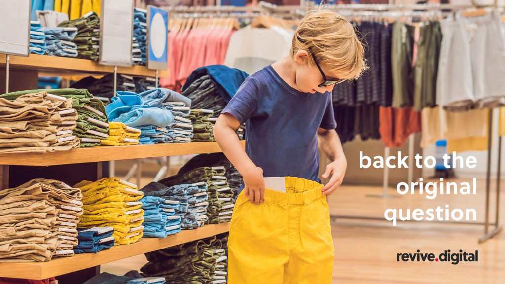 little kid trying shopping for jeans